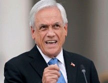 En una rueda de prensa en Santiago, Sebastián Piñera dijo que se desligó de la administración de sus empresas e intereses financieros en abril de 2019. AFP/J. Torres