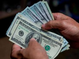 En operaciones al mayoreo, el dólar terminó en 20.56 pesos, aunque llegó a cotizar en un máximo de 21.89 unidades durante la mañana. EFE/ARCHIVO