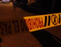 De los agresores nada se supo; personal del Ministerio Público y peritos acudieron al lugar para iniciar las investigaciones y llegar el cuerpo a la morgue metropolitana. EL INFORMADOR / ARCHIVO