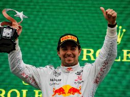 Este domingo, ''Checo'' Pérez acabó tercero el GP de Turquía y logró su tercer podio en lo que va de año y con su nuevo equipo, Red Bull. AFP / U. Bektas