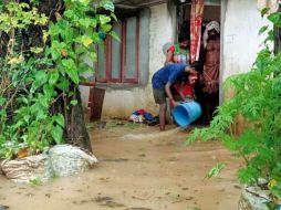 Los corrimientos de tierra y las inundaciones son habituales en la época del monzón en el Sur de Asia. XINHUA /
