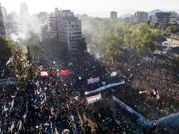 Aunque la mayoría de los asistentes a las marchas se manifestaron de manera pacífica, 30 personas fueron detenidas por vandalismo. AFP/J. Torres
