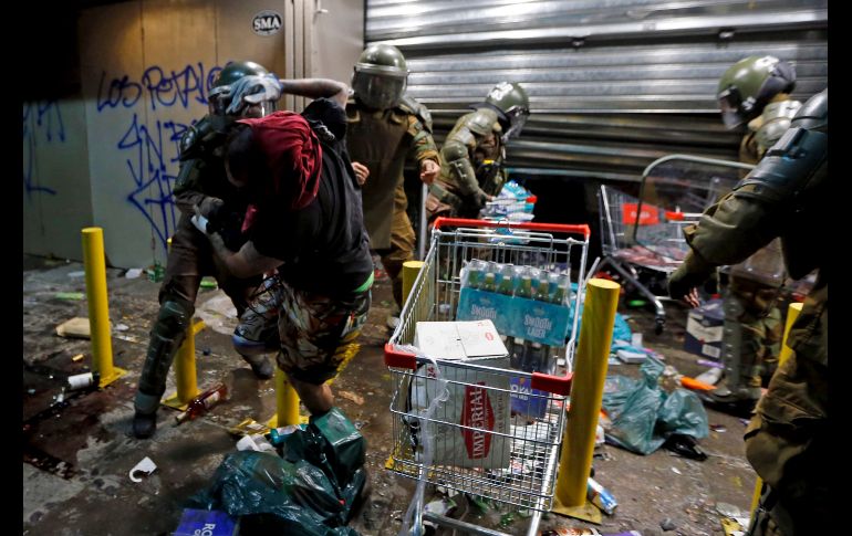 Saqueos producidos durante las manifestaciones en Chile. AP / ARCHIVO
