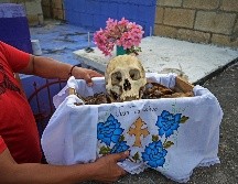 El ritual llamado en maya Choo Ba'ak se desarrolla unos 10 días antes de la festividad del Día de Muertos. AFP/L. Pérez,