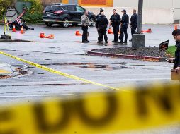 La policía entrevistaba a decenas de personas afuera de la entrada de la tienda departamental Macy's. AP/D. Oswald-Idaho Statesman