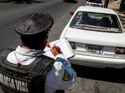 La ley en Jalisco establece que se puede sancionar a un automotor por ocultar parcial o totalmente la placa; la multa por este tipo de infracción podría ascender hasta casi 18 mil pesos. EL INFORMADOR/ARCHIVO