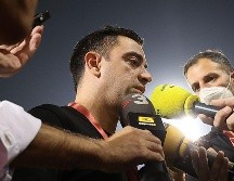 SUSPENSO. Aunque parece que el camino de Xavi conduce inevitablemente hacia Barcelona, su futuro aún no está arreglado. AFP/K. JAAFAR