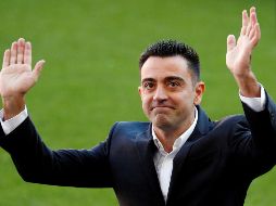 El Barcelona recibió a Xavi a lo grande, con una presentación en el césped del Camp Nou -primer técnico en la historia-, un recibimiento habitualmente reservado para los grandes fichajes. EFE / A. García