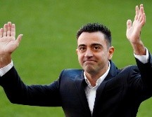 El Barcelona recibió a Xavi a lo grande, con una presentación en el césped del Camp Nou -primer técnico en la historia-, un recibimiento habitualmente reservado para los grandes fichajes. EFE / A. García