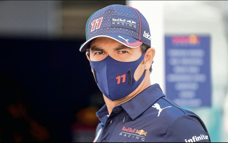 MOTIVADO. Luego de convertirse en el primer piloto mexicano en subir al podio en su país, Checo se motiva para ir por más. AFP