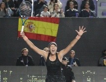 ILUSIONADA. La victoria le permite continuar a Garbiñe Muguruza con sus aspiraciones dentro de las AKRON WTA Finals. EL INFORMADOR/A. CAMACHO