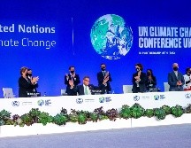 Con 24 horas de retraso sobre la agenda, la COP26 aprobó un texto que abre el paso a consultas formales para crear fondos de financiación. EFE/R. Perry