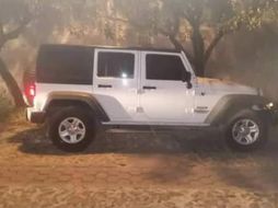 La camioneta Jeep se localzó en una calle empedrada en la colonia El Campesino, en Zapopan. ESPECIAL