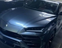 En un domicilio en Zapopan se aseguraron 14 vehículos de lujo y  una motocicleta. ESPECIAL/FGR