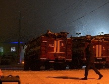 Rescatistas cerca de la mina  Listvyazhnaya, en la región de Kemerovo. AFP/A. Patrin