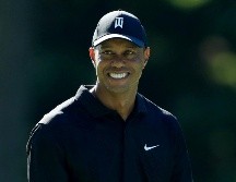 La estrella volverá a competir por primera vez desde su accidente de coche ocurrido en febrero, haciendo dupla con su hijo Charlie, en el torneo PNC Championship. AFP / ARCHIVO