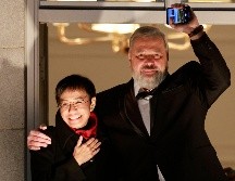 Maria Ressa, cofundadora de la página web de información Rappler, y Dmitri Muratov, redactor jefe del diario independiente Novaya Gazeta. AFP / O. Andersen