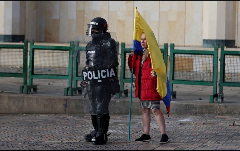 El informe lanzado por la ONU señala a la policía como los causantes de la muerte de 11 civiles en protestas de Colombia. AP/F. Vergara