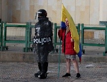 El informe lanzado por la ONU señala a la policía como los causantes de la muerte de 11 civiles en protestas de Colombia. AP/F. Vergara