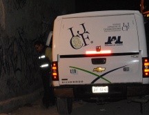 Peritos del Instituto Jalisciense de Ciencias Forenses (IJCF) recabaron indicios y trasladaron el cuerpo a sus instalaciones para realizar la autopsia de ley correspondiente. EL INFORMADOR/ARCHIVO