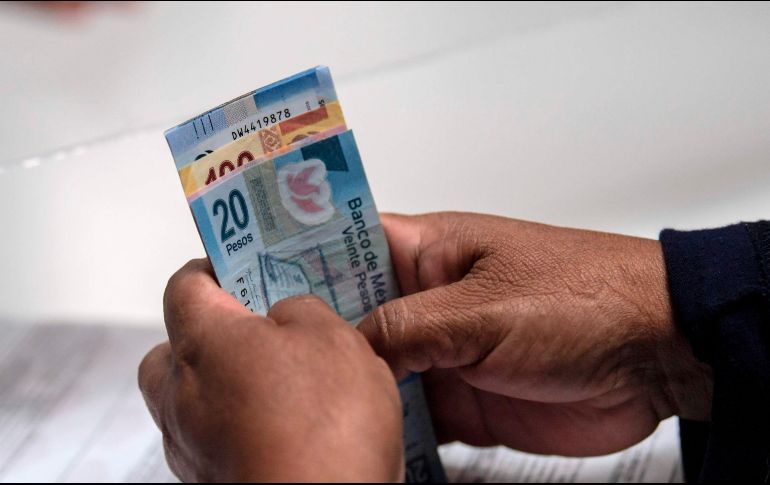 La ley en México establece sanciones por no pagar el aguinaldo en tiempo y forma. AFP/ARCHIVO