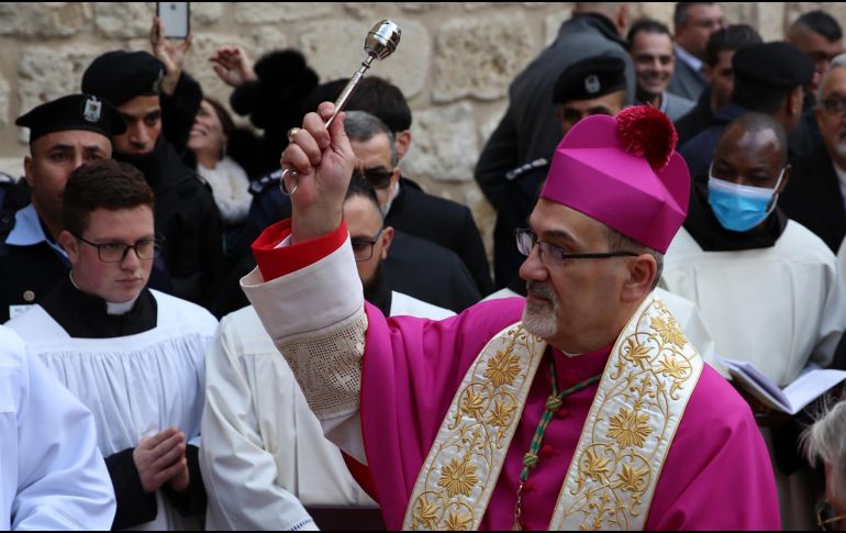 Si bien la mayoría de los palestinos cristianos que viven en Tierra Santa son ortodoxos y celebran la Navidad en enero, hay también una comunidad católica, que festeja para estas fechas. EFE / A. Al Hashlamoun
