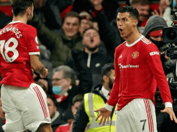 Goleadores. Cristiano y Bruno Fernandes festejando un gol dentro de la Liga inglesa. AP/ D. Thompson