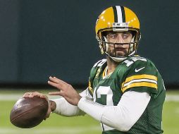 LEGENDARIO. El jugador de los Packers de Green Bay Aaron Rodgers convirtió su pase de anotación número 443. EFE/T. Maury