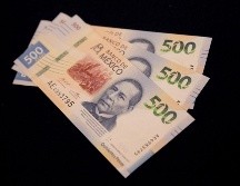 El peso se cotiza en más de 21 unidades por dólar. EFE/Archivo