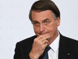 Bolsonaro recuerda que estos problemas derivan del atentado que sufrió el 6 de septiembre de 2018 al ser acuchillado en el abdomen. AFP / ARCHIVO