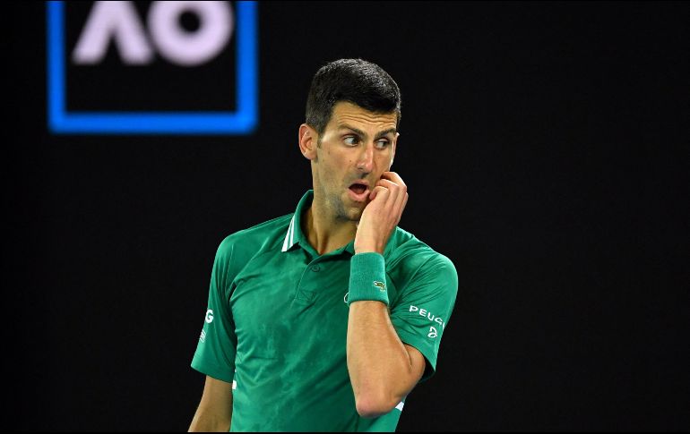 EN VILO. La audiencia de Djokovic determinará si podrá o no participar en el Abierto de Australia, en donde tiene una cita con la historia. AFP/P. Crock