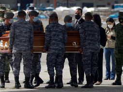 Contando los 19 cuerpos de migrantes fallecidos en el accidente carretero de Chiapas, ya son 49 los restos repatriados.  AFP/ J. Ordoñez