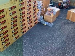 Imagen del Departamento de Justicia que muestra parte de las armas y municiones decomisados. AP/USDOJ