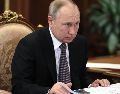 El Kremlin calificó hoy de "destructiva" para las relaciones entre Rusia y Occidente la idea de imponer sanciones al presidente Vladimir Putin, en caso de invasión de Ucrania. AFP / M. Metzel