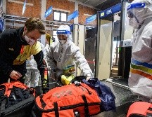 Los seis casos positivos se diagnosticaron tras las pruebas PCR realizadas por las autoridades chinas en el aeropuerto de la capital. AFP / A. Wallace