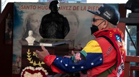 Hugo Chávez es venerado como una deidad en La Piedrita. AFP/Y. Cortez