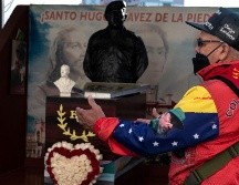 Hugo Chávez es venerado como una deidad en La Piedrita. AFP/Y. Cortez