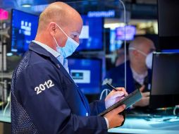 El parqué neoyorquino vivió una nueva jornada animado por una cierta estabilización en el mercado de deuda. AP/C. Crow