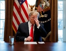 La semana pasada, los Archivos Nacionales también revelaron que Trump tenía la costumbre de romper algunos de sus documentos de trabajo, otra práctica contraria a la ley de 1978. AP / ARCHIVO