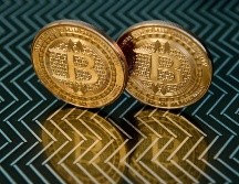 Si todo sale según lo planeado, los precios de la nueva criptomoneda suben y la ciudad obtiene dinero gratis. AFP/Archivo