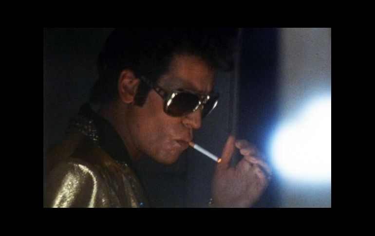 Val Kilmer en “True Romance”. En esta cinta el actor interpreta al fantasma de Elvis Presley, el mentor de Christian Slater (“Clarence”), un joven dependiente de una tienda de cómics y aficionado de las películas de artes marciales. 