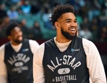 Karl-Anthony Towns se coronó como el campeón de los triples derrotando a un Kennard y Young. AFP/J. Miller