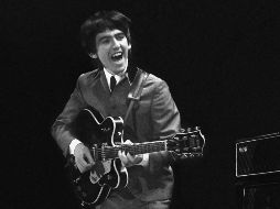 George Harrison. La foto fue tomada por Mike Mitchell durante el primer concierto de The Beatles en el Washington Coliseum, en Estados Unidos. AP/Archivo