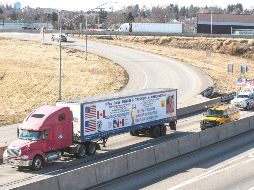 Transportistas alza a combustibles tras las sanciones económicas a Rusia. AP/S. Simmers