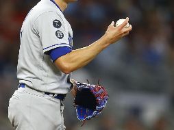 Entre los temas que buscan acordar el gremio de peloteros y la MLB están fijar un número de equipos en los playoffs, el tope del impuesto de lujo y aumentar el salario mínimo. AFP / ARCHIVO
