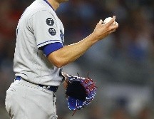 Entre los temas que buscan acordar el gremio de peloteros y la MLB están fijar un número de equipos en los playoffs, el tope del impuesto de lujo y aumentar el salario mínimo. AFP / ARCHIVO