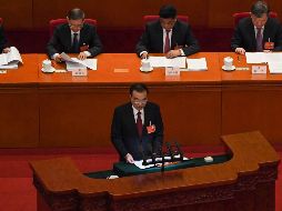 El primer ministro Li Keqiang desveló los pronósticos económicos para 2022 en el Gran Palacio del Pueblo. AFP/L. Ramírez