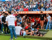 Aficionados del Atlas que no se vieron involucrados en los actos violentos no encontraban dónde resguardarse. IMAGO7