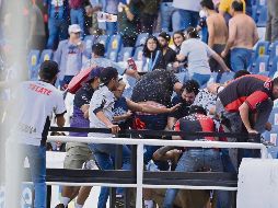 Descontrol. En La Corregidora no se aplicaron los protocolos adecuados para un partido de alto riesgo y buscan evitar eso en los estadios de la ciudad. Imago7