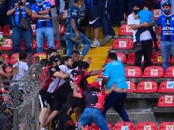 La violencia que surgió entre porras en el partido Querétaro vs Atlas dejó 26 heridos. IMAGO7 / ARCHIVO